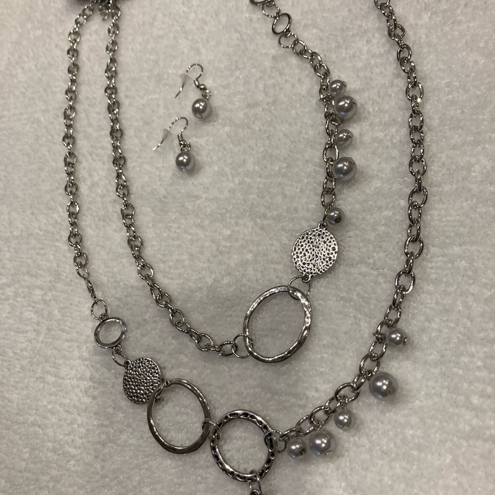 Silver charmed with pearls necklace with earrings